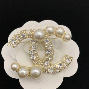 Chanel gold brooch